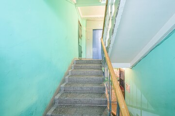interior apartment public place, house entrance. doors, walls, staircase corridors. staircase in a...