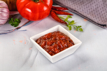 Salsa dip with chili and tomato