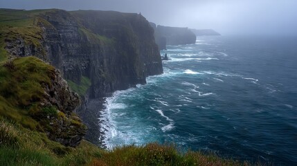 scenic view of cliffs of moher, ireland with dramatic coastline and ocean waves