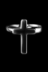 Fototapeta premium Cross ring on black