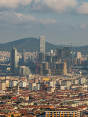 Obraz premium Modern cityscape featuring high-rise buildings and urban development, capturing architectural progress and transformation. Perfect for real estate, construction, and urban development content.