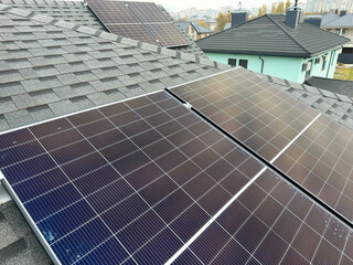 Solar panel system on residential roof for cost-effective energy.