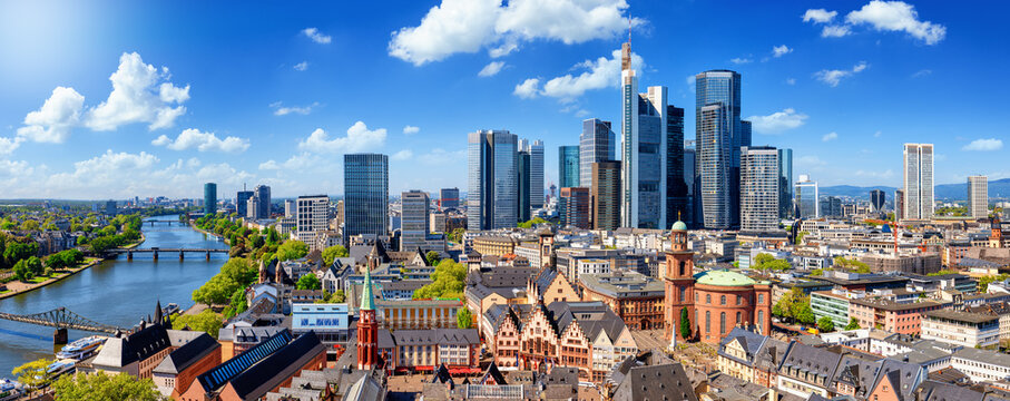 Beautiful, panoramic view of the skyline of Frankfurt, Germany, with old town, river Main and the financial skyscrapers in the background