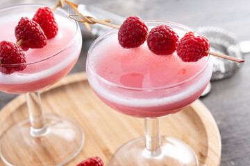 Elegant French Martini Cocktail on wooden table.