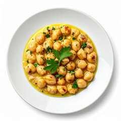 A plate showcases cooked chickpeas glistening with olive oil, parsley garnish, and a creamy base, ready to be enjoyed