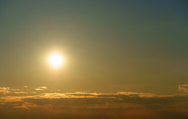 beautiful and dramatic sunset sky with bright yellow clouds as abstract background