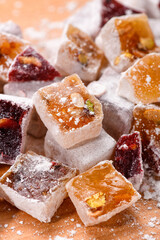 Sweet food Turkish delight, assorted rahat locum in form of cubes with nuts and powdered sugar, traditional food