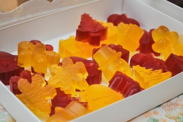 A delightful arrangement of colorful and festive gummy candies in a variety of fun shapes.