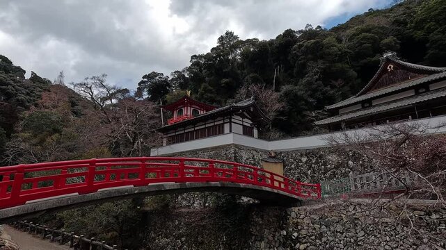 Beautiful red bridge at Buddhist temple Ryuan-ji at Minoh National Park near Osaka,Kansai Japan