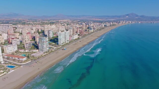 Aerial view drone San Juan beach skyline Alicante Spain turquoise sea shore