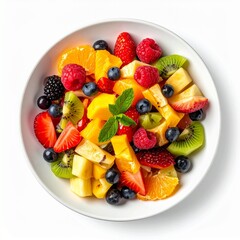 Obraz premium A colorful bowl of mixed fruit salad, arranged on a white surface. It's a healthy, vibrant dish