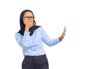 Portrait of annoyed young Asian woman makes stop gesture, covering her nose with hand isolated on transparent background