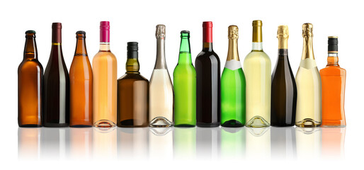 Bottles with different types of alcoholic drinks isolated on white, set