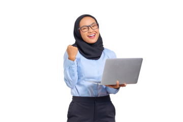 Portrait of smiling young Asian woman holding a laptop and celebrating success, looking at camera isolated on transparent background