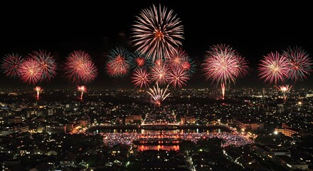 Fireworks Display over City at Night Festive Celebration Event
