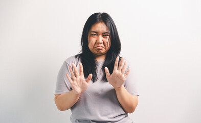 Asian girl expresses dislike, person express negative feeling, concept business complaint from...