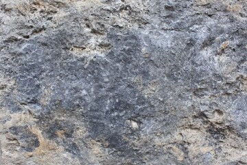 Gray stone surface with varied textures