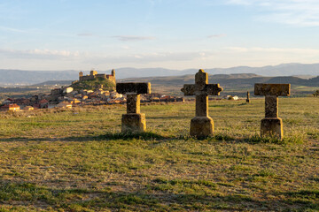 Old stone cross near to the fortress of the old village (Briones, Spain)