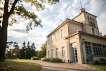 Fototapeta premium Beautiful architecture of a mansion with blurred background in nature outdoor viewpoint