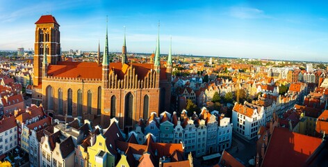 Cityscape aerial view on the old town with saint Marys church on the sunset in Gdansk, Poland