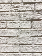 A white brick wall background texture for interior or exterior design.