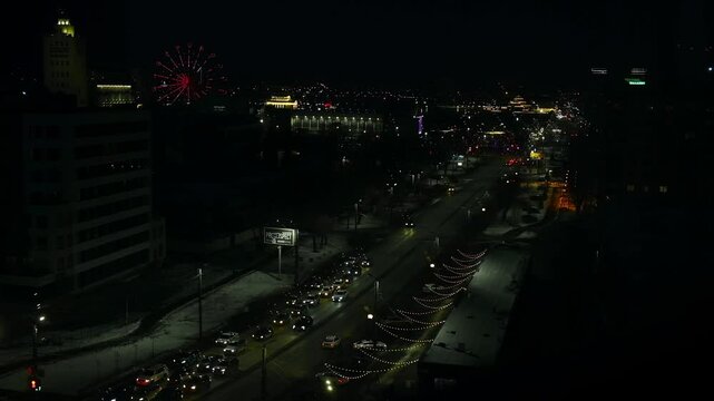 City from a height, cars driving, lights on, timelapse at night. High quality FullHD footage