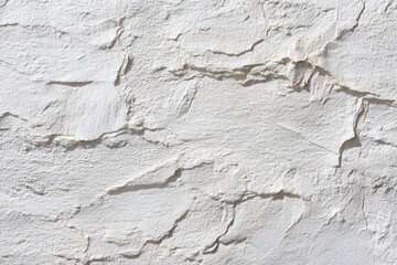 Naklejka premium Exploration of textured beauty in a white plaster wall revealing organic imperfections under clean daylight