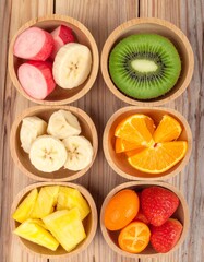  different slice fruit in different small wooden bowl