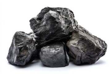 Obraz premium Natural coal chunks showcasing various textures and colors in a close-up setting against a plain background