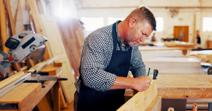 Carpentry, marking and pencil with man in workshop for manufacturing or production process. Accuracy, design and drawing with mature carpenter in woodworking studio for craftsmanship or manual labor
