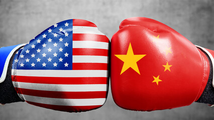 USA or United States of America and China flags painted on two boxing gloves. Concept of the United...