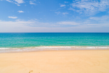 Beautiful sandy beach and sea in sunny day,Blue sky in good weather day, Beach sea space area nature background