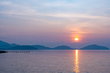 Nature beautiful light sunset or sunrise over sea surface,Colorful sunset sky with clouds and waves in the ocean,Wide angle sea background
