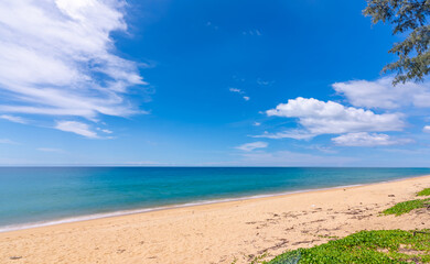 Beautiful sandy beach and sea in sunny day,Blue sky in good weather day, Beach sea space area nature background