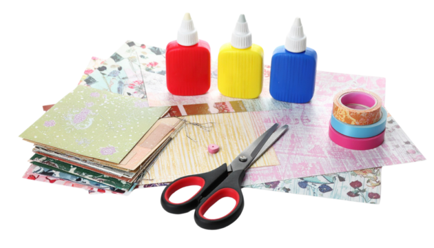 Scrapbooking supplies including scissors, patterned paper, and glue sticks isolated on white in Png format