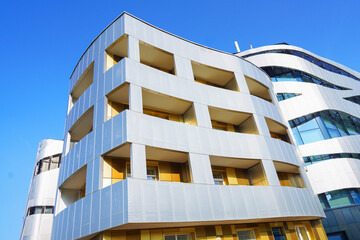 Futuristic building facade, background, texture. Modern architecture facade building with balconies.