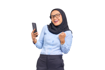Portrait of excited young Asian woman celebrating with mobile phone isolated on transparent background