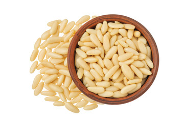 Shelled European pine nuts in ceramic bowl isolated on white background with full depth of field. Top view. Flat lay