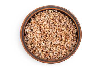 Boiled buckwheat in a ceramic bowl isolated on white background. Top view. Flat lay
