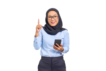Portrait of smiling young Asian woman pointing finger up and holding mobile phone isolated on transparent background