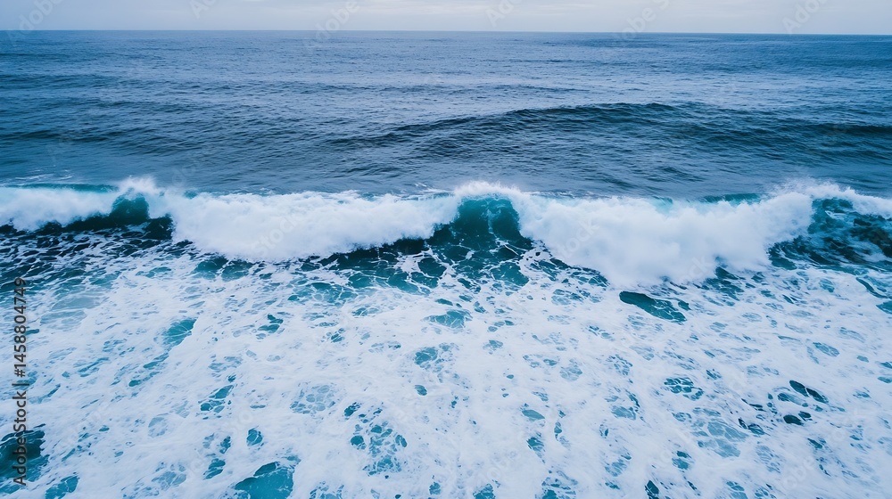 Aufkleber Aerial view of powerful ocean waves crashing, creating white foam and turquoise water. Dramatic seascape with deep blue water and textured wave crests. : Generative AI