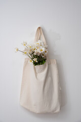 wildflowers in a reusable cloth vintage bag. Eco-friendly and natural. plastic-free and zero waste