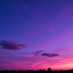 Vibrant Pink and Purple Sunset Sky over Cityscape