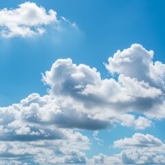 Fototapeta premium Bright Blue Sky with Fluffy White Cumulus Clouds