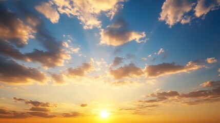 Obraz premium Golden sunset sky with fluffy cumulus clouds, vibrant orange and blue hues, sun rays breaking through, peaceful evening atmosphere. : Generative AI