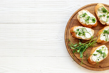Sandwiches with fresh sprouting microgreens. Sprouted peas seeds micro greens. Vegan food