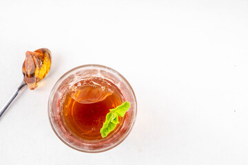 Black tea trendy asian dessert, diet non calorie sweet tea agar or gelatine jelly, in portioned glass, white table background copy space