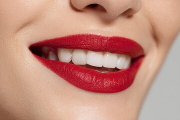 Fototapeta premium Woman Face with Red Lipstick and Teeth