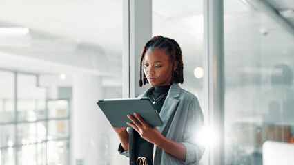 Business, black woman and tablet in office with internet connection for networking, communication...