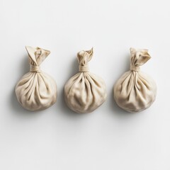 Obraz premium Three uncooked dumplings